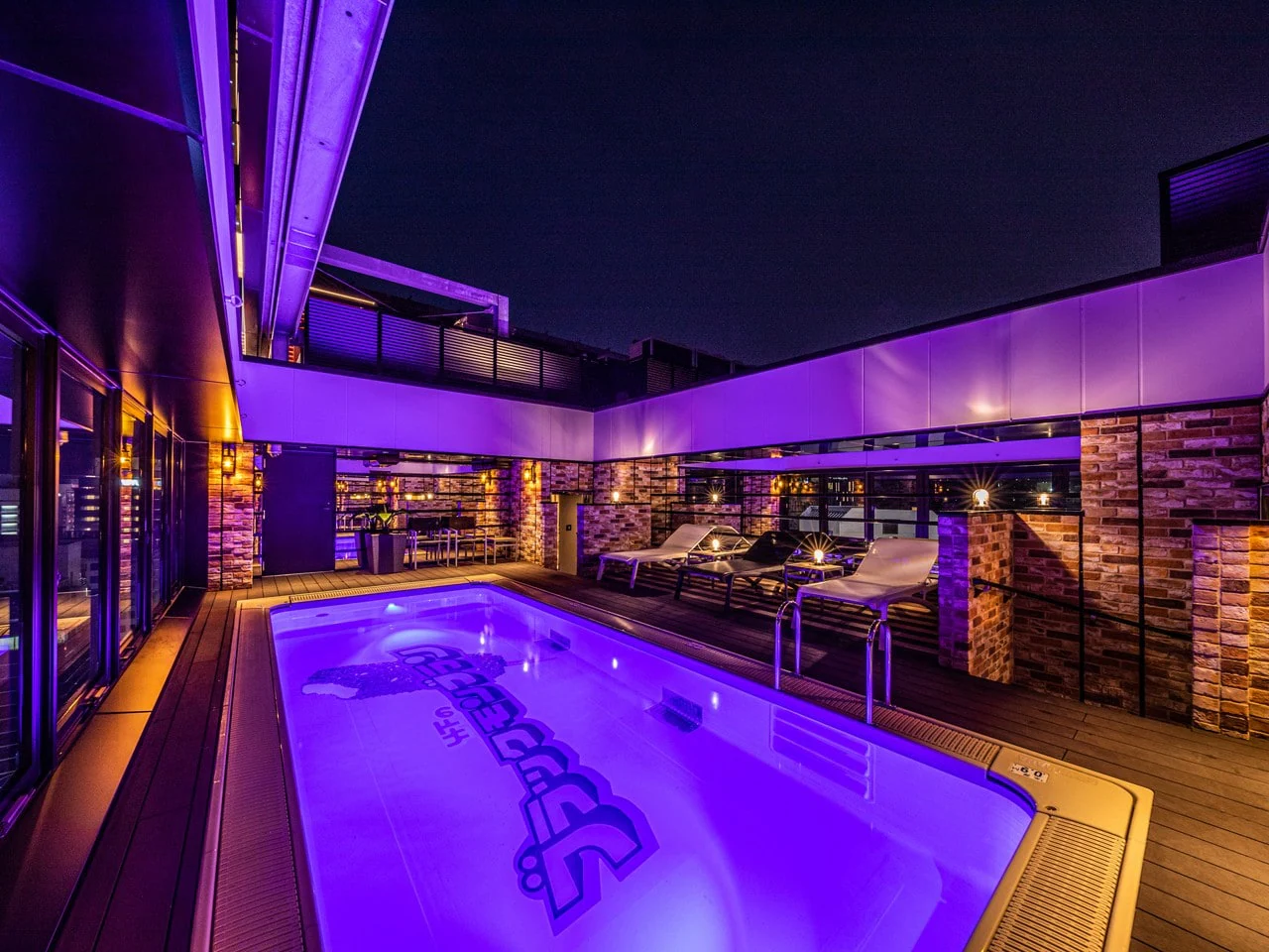 APA Hakata Ekihigashi rooftop swimming pool with city skyline view