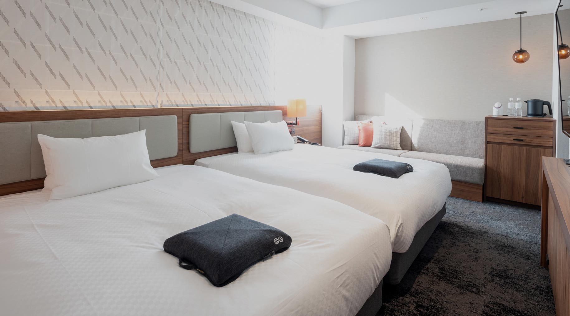 Hotel interior common area with warm lighting and contemporary design
