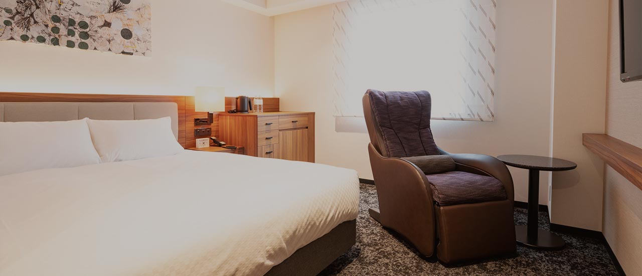 Healing Double room featuring the in-room massage chair — a Forza chain signature