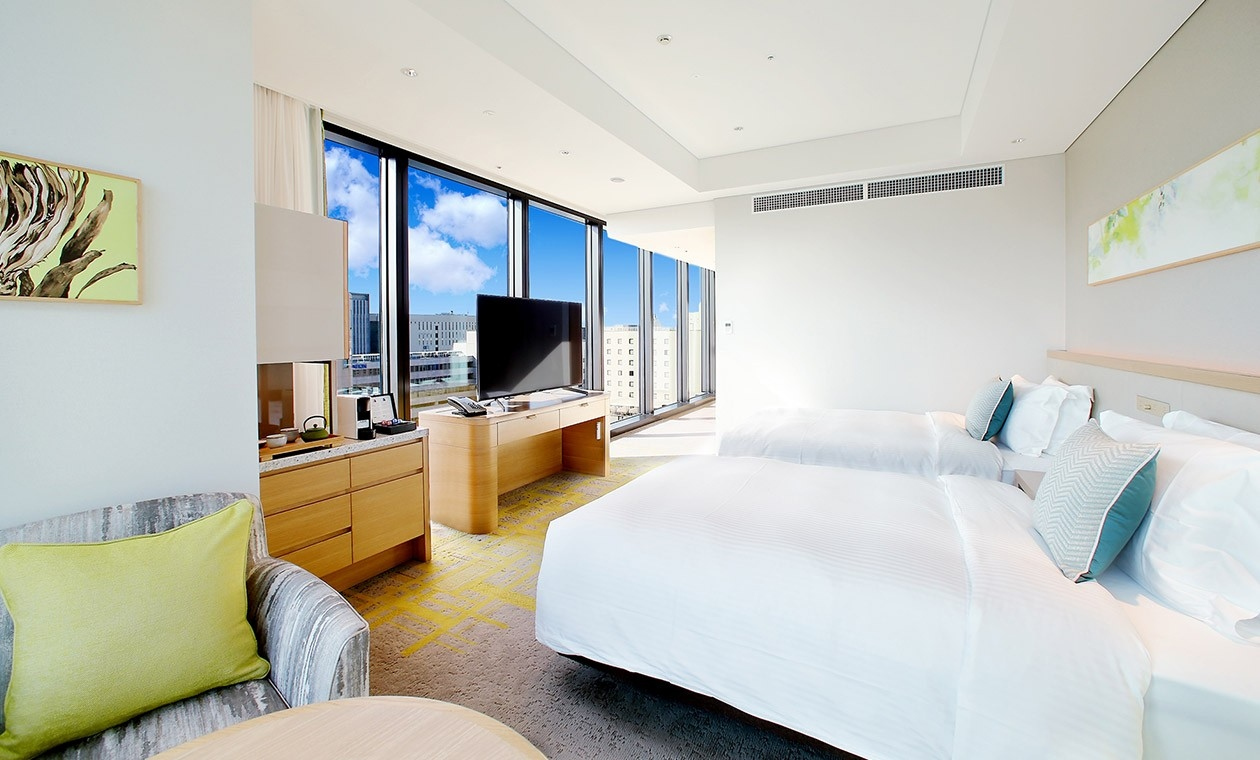 Standard guest room at Miyako Hotel Hakata, approximately 30 sqm with city view and queen bed