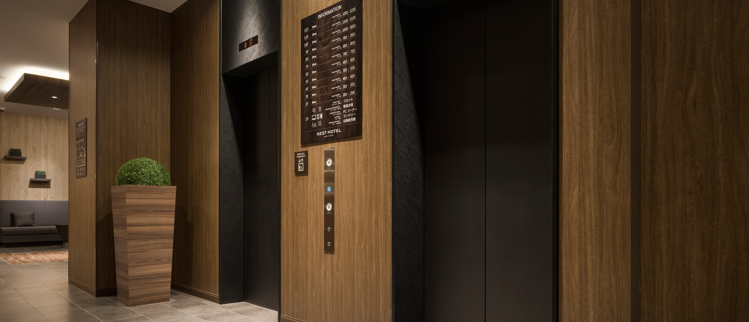 Hotel features overview including multilingual in-room TV system and Simmons bed detail