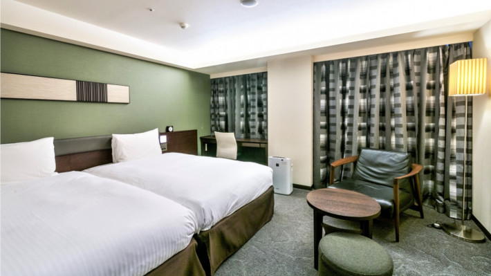 Richmond Twin — premium twin category with upgraded bedding and larger floorplan